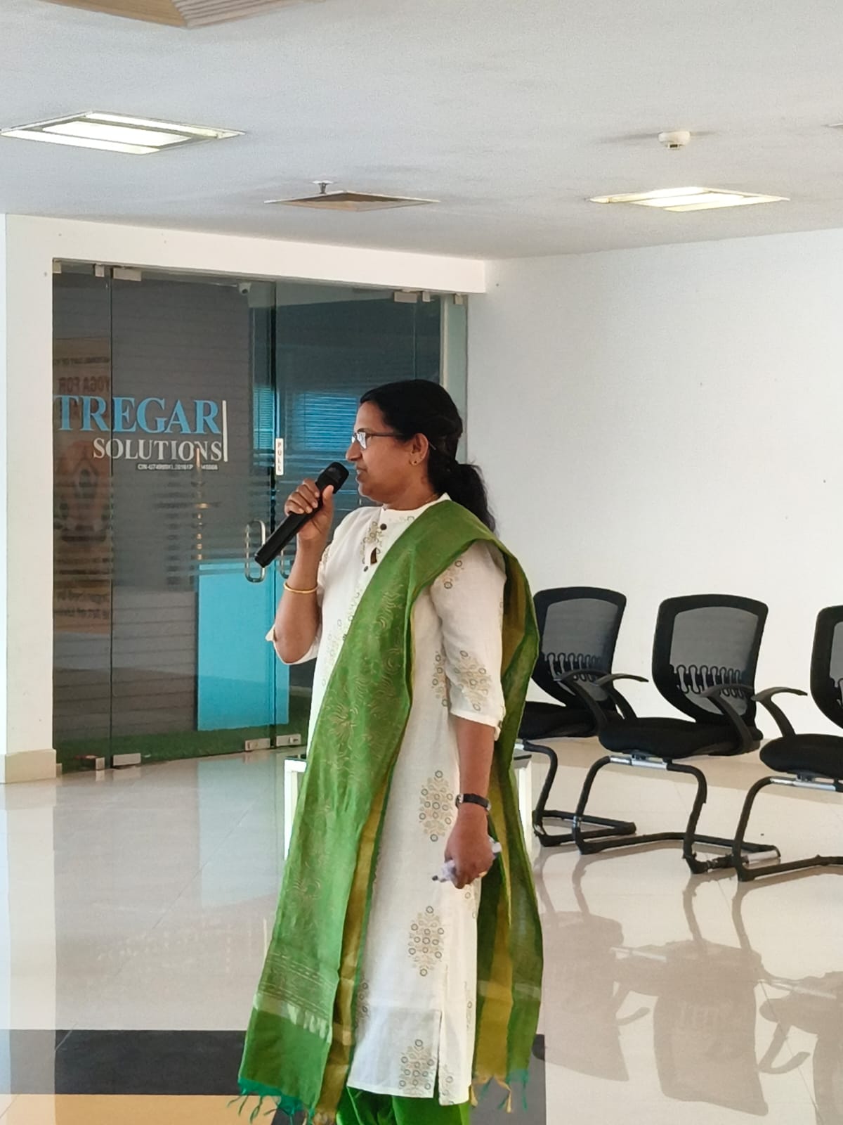 Adv. T. Rajambika leading the Yoga day session at Technopark Phase V, Kollam.
